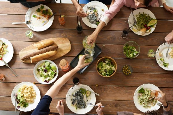 Table with people eating together